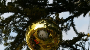 Dow, S&P 500 end at records amid talk of Santa rally