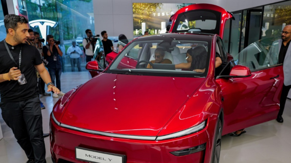 Tesla marks India entry with first showroom 