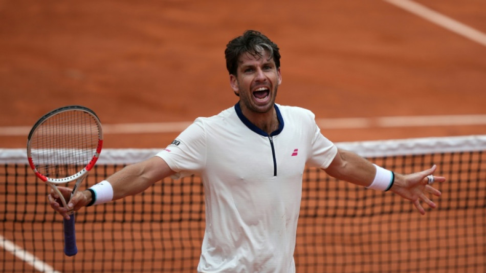 Norrie outlasts Medvedev in five sets to reach French Open second round