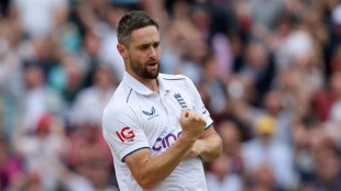 Woakes' double strike revives England's bid to level Ashes
