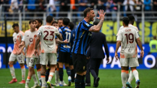 Inter downed by Roma, AC Milan bounce back with victory in Venice