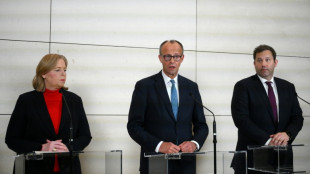 Germany unveils debt-laden budget, relief measures