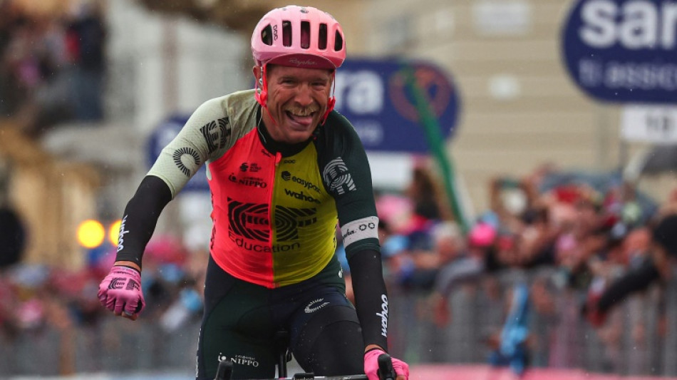 Denmark's Cort escapes to victory as Giro resumes in the rain