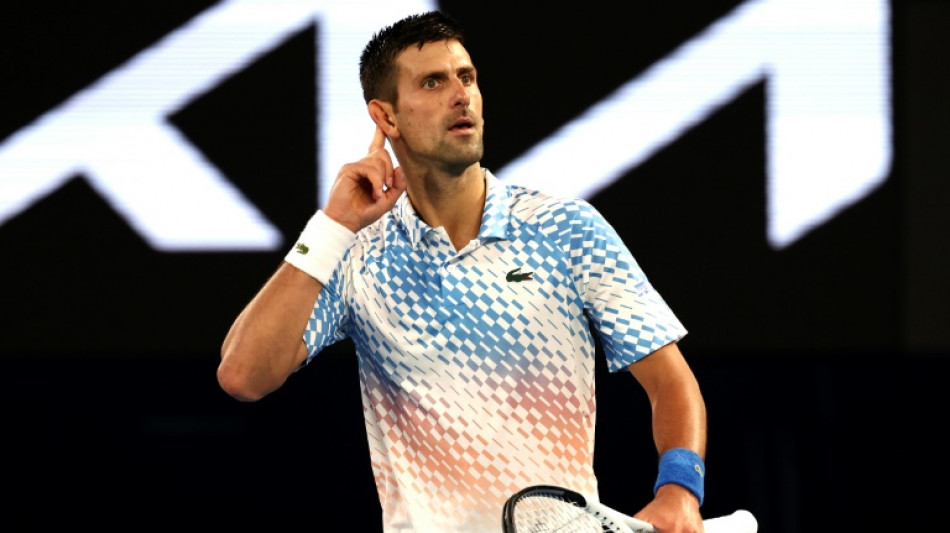 Djokovic defies controversy to surge into Australian Open final