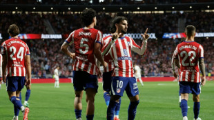 Improving Atletico cruise to comfortable win over Osasuna
