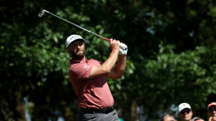 Rahm grabs two-stroke Masters lead as back-nine battle begins