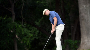 Hall leads by three at Colonial