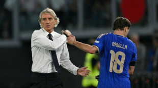 Mancini finds positives in Italy loss, accepts fans' jeers