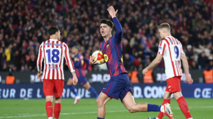 Atletico hammered but hold off Barca to reach Copa del Rey final