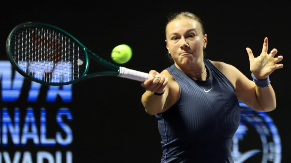 Anisimova beats Swiatek to reach WTA Finals last four