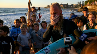 Australian surfs for 40 hours to smash world record