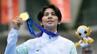 Taiwan gender-row boxer Lin Yu-ting wins 'monumental' Asian Games gold
