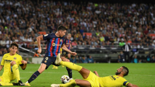 Lewandowski double eases Barca woes in Villarreal rout