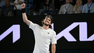 'Different' Tsitsipas powers into Australian Open semi-finals
