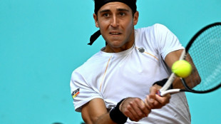 Etcheverry lines up Djokovic clash in Rome as Wawrinka moves on