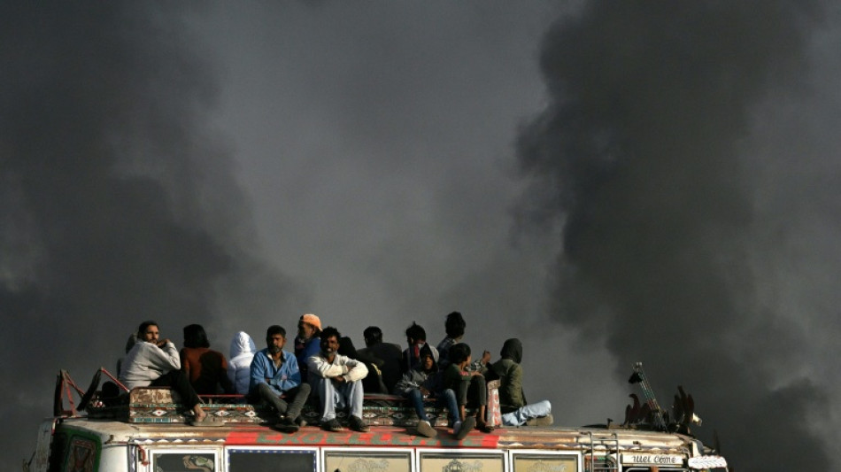 With monitors and lawsuits, Pakistanis fight for clean air