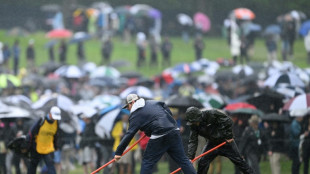 PGA leaders launch third round at rain-soaked Oak Hill