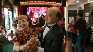 Shanghai's elderly waltz back to the past at lunchtime dance halls