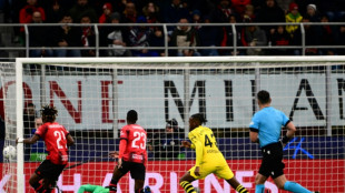 Dortmund see off Milan to reach Champions League knockouts