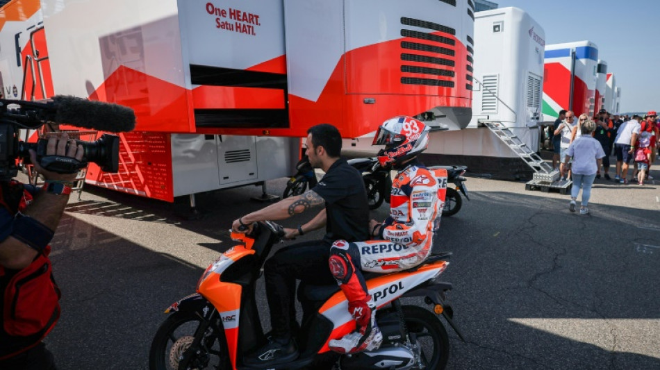 Marquez breaks finger in warm-up but will race in German MotoGP