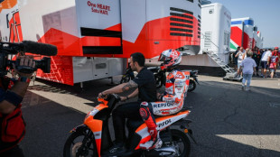 Marquez breaks finger in warm-up but will race in German MotoGP