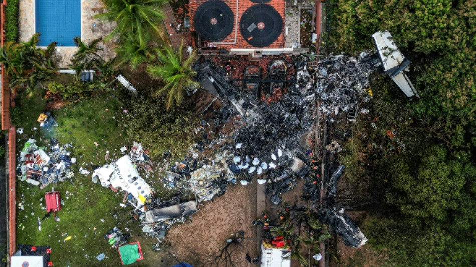 Workers recovering bodies from Brazil plane crash, inquiry underway
